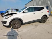 ✅ 2015 Hyundai Santa Fe • VIN: 5XYZTDLB4FG256034 • Лот: 70723365. Опубликован ранее на Copart с пробегом 133 656 миль. Бесплатный доступ к архиву аукционных продаж из США и подробный отчёт об истории автомобиля на DreamBid. Изображение 1.