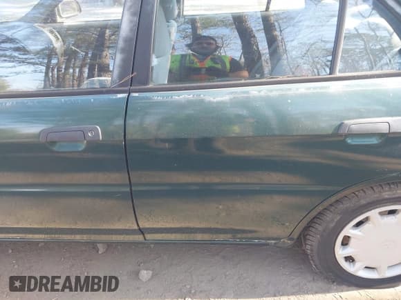 ✅ 2001 Mitsubishi Mirage ES • VIN: JA3AY26C01U042235 • Lot: 41899635. Listed on IAAI with 101,058 mi. Free auction sales archive from the USA and detailed vehicle history report at DreamBid. Image 6.