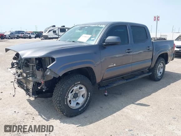 ✅ 2021 Toyota Tacoma SR • VIN: 5TFCZ5AN5MX258408 • Лот: 42388670. Опубликован ранее на IAAI с пробегом 73 611 миль. Бесплатный доступ к архиву аукционных продаж из США и подробный отчёт об истории автомобиля на DreamBid. Изображение 2.