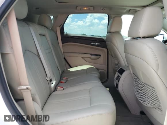 ✅ 2013 Cadillac SRX Performance Collection • VIN: 3GYFNDE38DS631335 • Lot: 60399855. Listed on Copart with 69,395 mi. Free auction sales archive from the USA and detailed vehicle history report at DreamBid. Image 10.