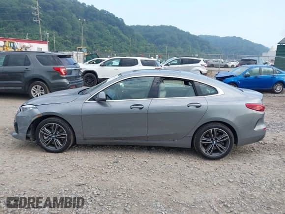 ✅ 2023 BMW 2 Series 228i xDrive • VIN: WBA73AK01P7L83874 • Lot: 42705294. Listed on IAAI with 7,448 mi. Free auction sales archive from the USA and detailed vehicle history report at DreamBid. Image 14.