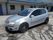 ✅ 2009 Volkswagen Rabbit S • VIN: WVWBA71K39W082458 • Лот: 58893355. Опубликован ранее на Copart с пробегом 154 963 миль. Бесплатный доступ к архиву аукционных продаж из США и подробный отчёт об истории автомобиля на DreamBid. Изображение 1.