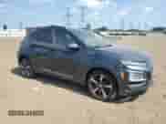 2018 Hyundai Kona Ultimate with VIN KM8K53A58JU137960, listed as a Copart auction lot 61100645 with 73,889 mi miles and Salvage title. Bid and sale history available at DreamBid. Image 4.