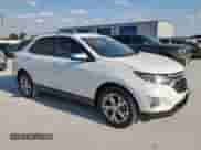 2018 Chevrolet Equinox Premier z VIN 3GNAXMEV3JS517340, wystawiony jako Copart lot #68435595 z przebiegiem 104 741 mil mil oraz Czysty tytuł • Clean title. Historia ofert i sprzedaży dostępna na DreamBid. Obrazek 4.