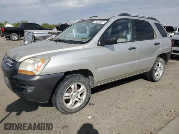 ✅ 2006 Kia Sportage LX • VIN: KNDJF723967231076 • Лот: 83759315. Опубликован ранее на Copart с пробегом 174 750 миль. Бесплатный доступ к архиву аукционных продаж из США и подробный отчёт об истории автомобиля на DreamBid. Изображение 1.