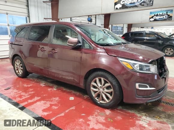 ✅ 2020 Kia Sedona LX • VIN: KNDMB5C1XL6577195 • Lot: 92217215. Listed on Copart with 128,392 mi. Free auction sales archive from the USA and detailed vehicle history report at DreamBid. Image 4.