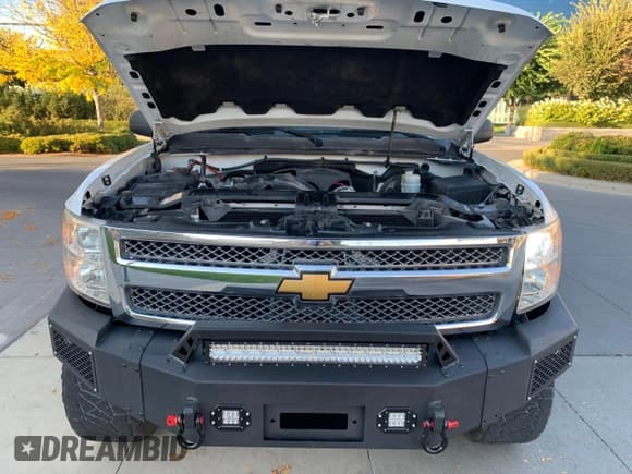 ✅ 2012 Chevrolet Silverado 1500 LT • VIN: 1GCRKSE74CZ137896 • Lot: 75107574. Listed on Copart with 143,614 mi. Free auction sales archive from the USA and detailed vehicle history report at DreamBid. Image 7.