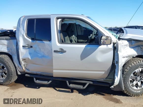 ✅ 2019 Nissan Frontier SL • VIN: 1N6AD0EVXKN712788 • Lot: 43817647. Listed on IAAI with 54,127 mi. Free auction sales archive from the USA and detailed vehicle history report at DreamBid. Image 14.