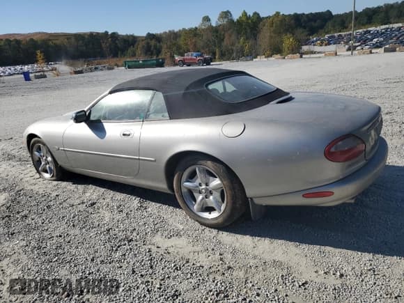 ✅ 1999 Jaguar XK • VIN: SAJGX2041XC040090 • Lot: 82702205. Listed on Copart with Not provided. Free auction sales archive from the USA and detailed vehicle history report at DreamBid. Image 2.