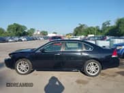 ✅ 2014 Chevrolet Impala LTZ • VIN: 2G1WC5E34E1121782 • Lot: 42543786. Listed on IAAI with 111,767 mi. Free auction sales archive from the USA and detailed vehicle history report at DreamBid. Image 15.