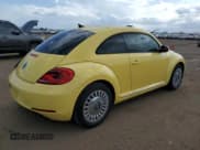 ✅ 2014 Volkswagen Beetle 2.5L • VIN: 3VWHX7AT6EM632938 • Lot: 58599124. Listed on Copart with 89,546 mi. Free auction sales archive from the USA and detailed vehicle history report at DreamBid. Image 3.