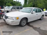 ✅ 1998 Lincoln Town Car Signature • VIN: 1LNFM82W5WY678263 • Lot: 42884109. Listed on IAAI with 128,024 mi. Free auction sales archive from the USA and detailed vehicle history report at DreamBid. Image 18.