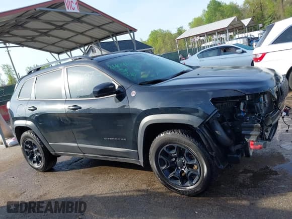 ✅ 2022 Jeep Cherokee Trailhawk • VIN: 1C4PJMBX1ND533715 • Lot: 42041057. Listed on IAAI with 65,487 mi. Free auction sales archive from the USA and detailed vehicle history report at DreamBid. Image 14.