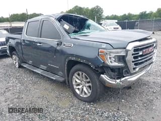 ✅ 2021 GMC Sierra 1500 SLT • VIN: 3GTU9DED9MG191347 • Lot: 42918432. Listed on IAAI with 142,464 mi. Free auction sales archive from the USA and detailed vehicle history report at DreamBid. Image 1.