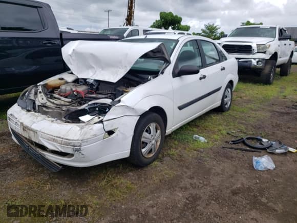 ✅ 2004 Ford Focus LX • VIN: 1FAFP33P74W164340 • Lot: 70513195. Listed on Copart with 186,485 mi. Free auction sales archive from the USA and detailed vehicle history report at DreamBid. Image 1.