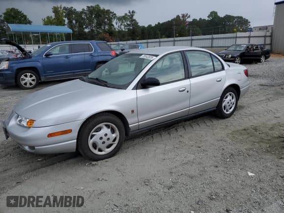 ✅ 2002 Saturn SL • VIN: 1G8ZK52702Z264191 • Лот: 70042825. Опубликован ранее на Copart с пробегом 118 826 миль. Бесплатный доступ к архиву аукционных продаж из США и подробный отчёт об истории автомобиля на DreamBid. Изображение 1.