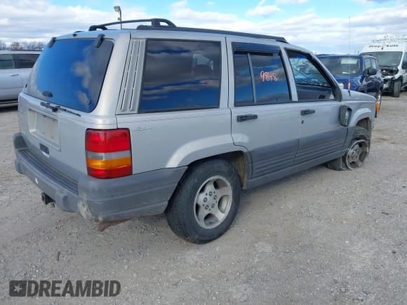 ✅ 1997 Jeep Grand Cherokee Laredo • VIN: 1J4GZ58S9VC533956 • Lot: 43709848. Listed on IAAI with 93,625 mi. Free auction sales archive from the USA and detailed vehicle history report at DreamBid. Image 4.