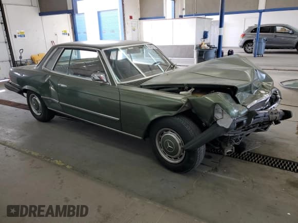 ✅ 1974 Mercedes-Benz SLC • VIN: 10702412005861 • Лот: 84430165. Опубликован ранее на Copart с пробегом 82 578 миль. Бесплатный доступ к архиву аукционных продаж из США и подробный отчёт об истории автомобиля на DreamBid. Изображение 4.