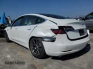 ✅ 2020 Tesla Model 3 Standard Range Plus • VIN: 5YJ3E1EA8LF808169 • Лот: 84801645. Опубликован ранее на Copart с пробегом 40 002 миль. Бесплатный доступ к архиву аукционных продаж из США и подробный отчёт об истории автомобиля на DreamBid. Изображение 2.