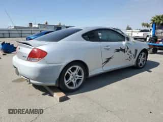 2005 Hyundai Tiburon GT с VIN KMHHN65F05U169144, выставлен на аукционе Copart как лот 67944695 с пробегом 139 483 миль миль и Списание • Salvage title. История ставок и продаж доступна на DreamBid. Изображение 3.