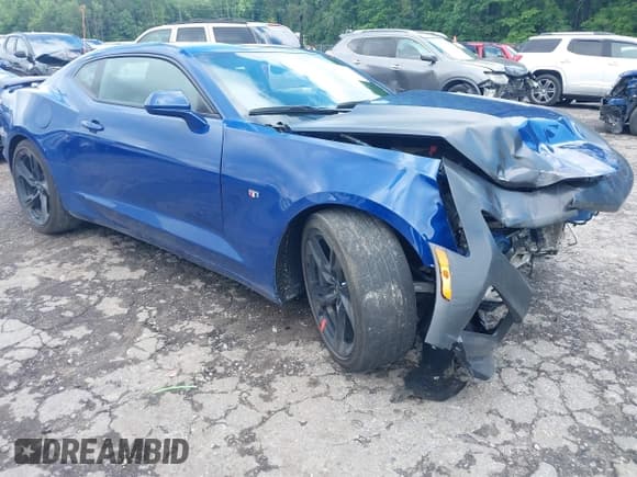 ✅ 2022 Chevrolet Camaro 1LT • VIN: 1G1FB1RX3N0101236 • Lot: 42252661. Listed on IAAI with 51,776 mi. Free auction sales archive from the USA and detailed vehicle history report at DreamBid. Image 1.