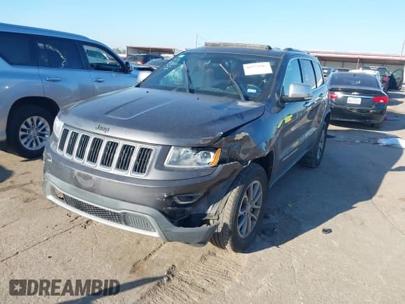 ✅ 2015 Jeep Grand Cherokee Limited • VIN: 1C4RJEBG5FC872385 • Lot: 43373943. Listed on IAAI with 124,519 mi. Free auction sales archive from the USA and detailed vehicle history report at DreamBid. Image 2.
