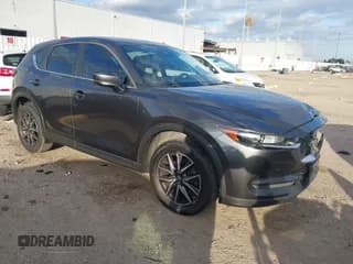 ✅ 2018 Mazda CX-5 Touring • VIN: JM3KFACM8J0375736 • Lot: 43673038. Wystawiony na IAAI z przebiegiem 111 478 mil. Bezpłatny archiwum sprzedaży aukcyjnych z USA i szczegółowy raport historii pojazdu na DreamBid. Zdjęcie 1.