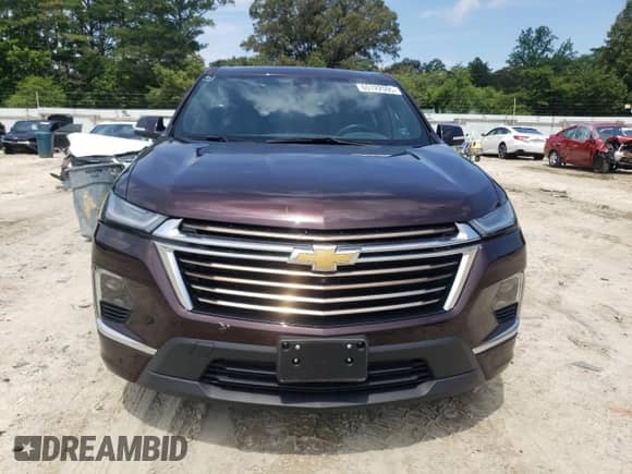 2022 Chevrolet Traverse High Country с VIN 1GNEVNKW4NJ176435, выставлен на аукционе Copart как лот 65122595 с пробегом 21 841 миль миль и Списание • Salvage title. История ставок и продаж доступна на DreamBid. Изображение 5.