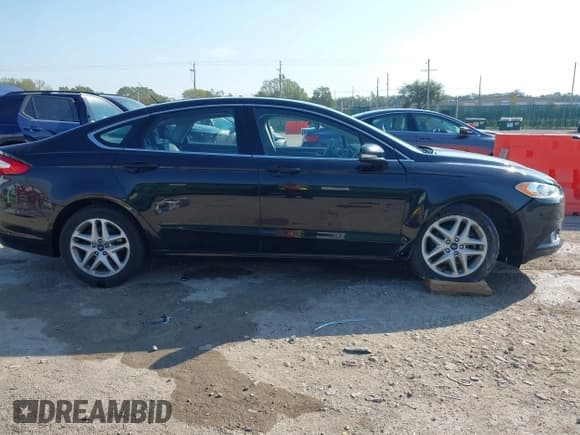 ✅ 2015 Ford Fusion SE • VIN: 3FA6P0HD6FR263685 • Лот: 43472227. Опубликован ранее на IAAI с пробегом 91 998 миль. Бесплатный доступ к архиву аукционных продаж из США и подробный отчёт об истории автомобиля на DreamBid. Изображение 13.