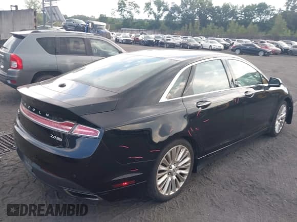 ✅ 2016 Lincoln MKZ • VIN: 3LN6L2J93GR607607 • Lot: 42810370. Listed on IAAI with 131,030 mi. Free auction sales archive from the USA and detailed vehicle history report at DreamBid. Image 4.