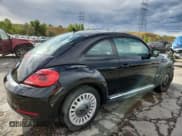 ✅ 2014 Volkswagen Beetle 1.8T • VIN: 3VWJ07AT8EM660665 • Lot: 80188155. Listed on Copart with 163,144 mi. Free auction sales archive from the USA and detailed vehicle history report at DreamBid. Image 3.