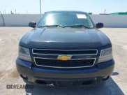 ✅ 2014 Chevrolet Tahoe Commercial • VIN: 1GNLC2E07ER210629 • Lot: 43138340. Listed on IAAI with 190,691 mi. Free auction sales archive from the USA and detailed vehicle history report at DreamBid. Image 12.