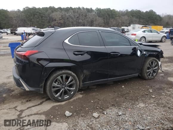 ✅ 2022 Lexus UX 200 F Sport • VIN: JTHE3JBH8N2054534 • Лот: 42999155. Опубликован ранее на Copart с пробегом 40 210 миль. Бесплатный доступ к архиву аукционных продаж из США и подробный отчёт об истории автомобиля на DreamBid. Изображение 3.