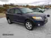 2011 Hyundai Santa Fe SE z VIN 5XYZHDAG2BG065786, wystawiony jako Copart lot #71679174 z przebiegiem 115 324 mil mil oraz Szkoda całkowita • Salvage title. Historia ofert i sprzedaży dostępna na DreamBid. Obrazek 4.