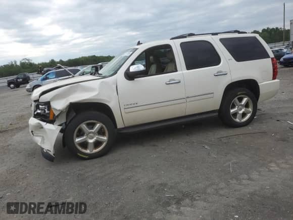 2013 Chevrolet Tahoe LTZ z VIN 1GNSKCE0XDR192002, wystawiony jako Copart lot #65217315 z przebiegiem 125 727 mil mil oraz Szkoda całkowita • Salvage title. Historia ofert i sprzedaży dostępna na DreamBid. Obrazek 1.