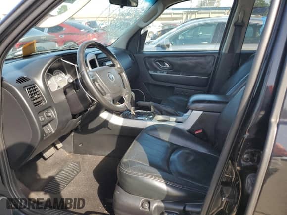 2006 Mercury Mariner Luxury z VIN 4M2CU56126KJ18508, wystawiony jako Copart lot #56960375 z przebiegiem 120 208 mil mil oraz Szkoda całkowita • Salvage title. Historia ofert i sprzedaży dostępna na DreamBid. Obrazek 7.