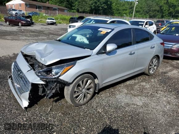 2020 Hyundai Accent Limited z VIN 3KPC34A60LE123971, wystawiony jako Copart lot #65095685 z przebiegiem Nie podano mil oraz Szkoda całkowita • Salvage title. Historia ofert i sprzedaży dostępna na DreamBid. Obrazek 1.