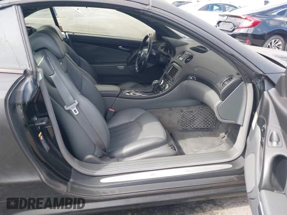 ✅ 2006 Mercedes-Benz SL 55 AMG • VIN: WDBSK74F26F110482 • Lot: 42094546. Wystawiony na IAAI z przebiegiem 83 512 mil. Bezpłatny archiwum sprzedaży aukcyjnych z USA i szczegółowy raport historii pojazdu na DreamBid. Zdjęcie 5.