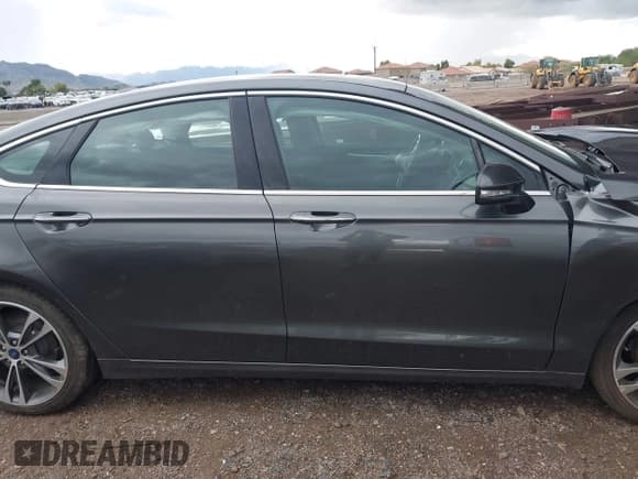 ✅ 2019 Ford Fusion Titanium • VIN: 3FA6P0K92KR260751 • Лот: 43742986. Опубликован ранее на IAAI с пробегом 47 738 миль. Бесплатный доступ к архиву аукционных продаж из США и подробный отчёт об истории автомобиля на DreamBid. Изображение 14.