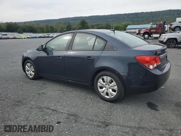 ✅ 2014 Chevrolet Cruze LS • VIN: 1G1PA5SG5E7110956 • Lot: 84618035. Listed on Copart with 57,193 mi. Free auction sales archive from the USA and detailed vehicle history report at DreamBid. Image 2.