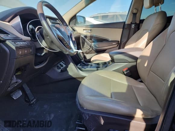 ✅ 2017 Hyundai Santa Fe 2.4L • VIN: 5XYZUDLB3HG462560 • Lot: 89849245. Listed on Copart with 76,475 mi. Free auction sales archive from the USA and detailed vehicle history report at DreamBid. Image 7.