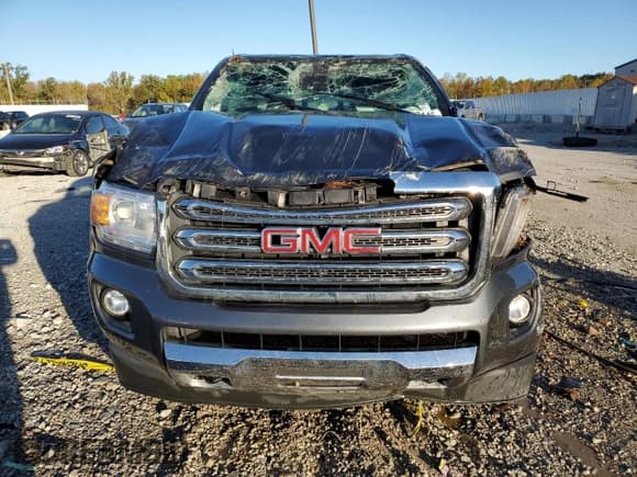 ✅ 2016 GMC Canyon 4WD SLT • VIN: 1GTG6DE3XG1115989 • Lot: 87107145. Listed on Copart with 73,482 mi. Free auction sales archive from the USA and detailed vehicle history report at DreamBid. Image 5.