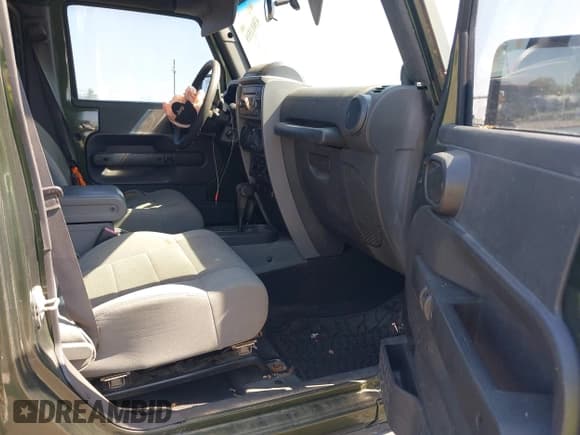 ✅ 2007 Jeep Wrangler Unlimited Sahara • VIN: 1J4GA59157L198095 • Lot: 43011519. Listed on IAAI with 198,022 mi. Free auction sales archive from the USA and detailed vehicle history report at DreamBid. Image 5.