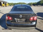 ✅ 2009 Volkswagen Jetta Wolfsburg Edition • VIN: 3VWRA71K69M044959 • Лот: 69512205. Опубликован ранее на Copart с пробегом 80 485 миль. Бесплатный доступ к архиву аукционных продаж из США и подробный отчёт об истории автомобиля на DreamBid. Изображение 6.