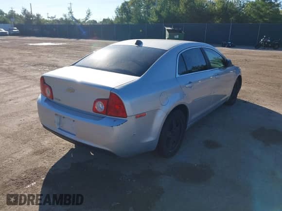 2012 Chevrolet Malibu 1LS with VIN 1G1ZB5E05CF240002, listed as a IAAI auction lot 43385460 with 151,059 mi miles and . Bid and sale history available at DreamBid. Image 4.