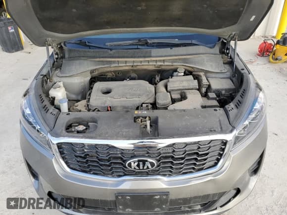 ✅ 2019 Kia Sorento LX • VIN: 5XYPG4A35KG471200 • Лот: 90474615. Опубликован ранее на Copart с пробегом 122 849 миль. Бесплатный доступ к архиву аукционных продаж из США и подробный отчёт об истории автомобиля на DreamBid. Изображение 12.