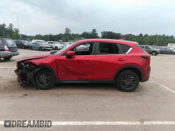 ✅ 2021 Mazda CX-5 Touring • VIN: JM3KFBCMXM1303358 • Lot: 42829675. Wystawiony na IAAI z przebiegiem 53 848 mil. Bezpłatny archiwum sprzedaży aukcyjnych z USA i szczegółowy raport historii pojazdu na DreamBid. Zdjęcie 14.