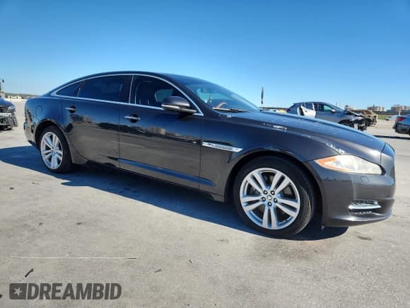 ✅ 2011 Jaguar XJ XJL • VIN: SAJWA2GB6BLV14965 • Lot: 91115555. Listed on Copart with 148,114 mi. Free auction sales archive from the USA and detailed vehicle history report at DreamBid. Image 4.
