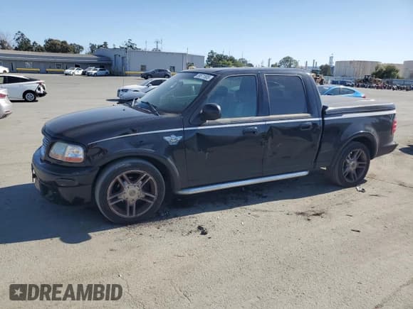 ✅ 2003 Ford F-150 Harley-Davidson • VIN: 1FTRW07373KC44985 • Lot: 58571585. Listed on Copart with 202,249 mi. Free auction sales archive from the USA and detailed vehicle history report at DreamBid. Image 1.