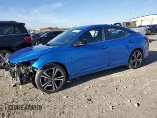 ✅ 2022 Nissan Sentra SR • VIN: 3N1AB8DV5NY309725 • Lot: 90722645. Wystawiony na Copart z przebiegiem 21 459 mil. Bezpłatny archiwum sprzedaży aukcyjnych z USA i szczegółowy raport historii pojazdu na DreamBid. Zdjęcie 1.